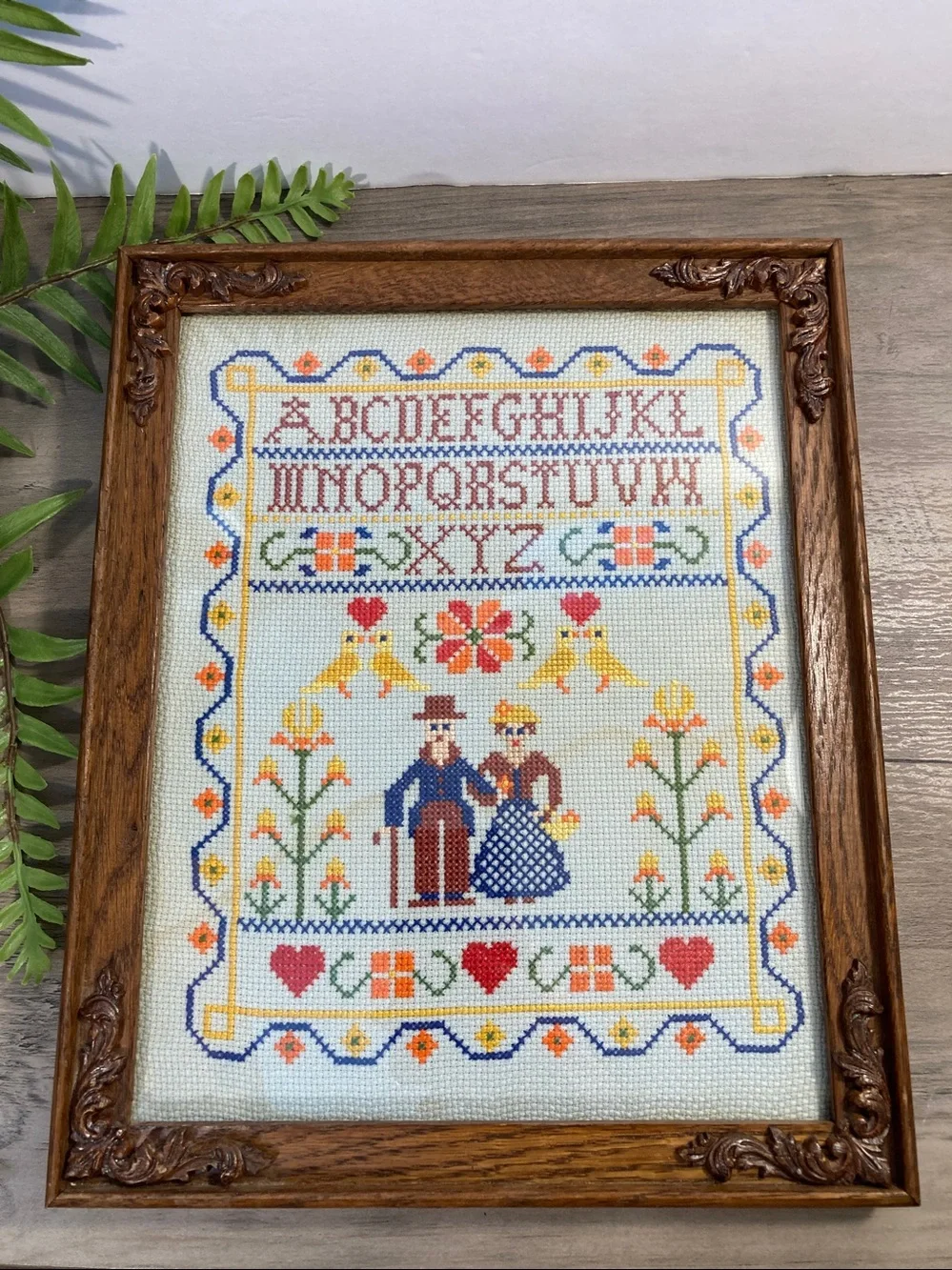 Vintage Framed Cross Stitch Sampler With Alphabet Flowers Birds And Couple